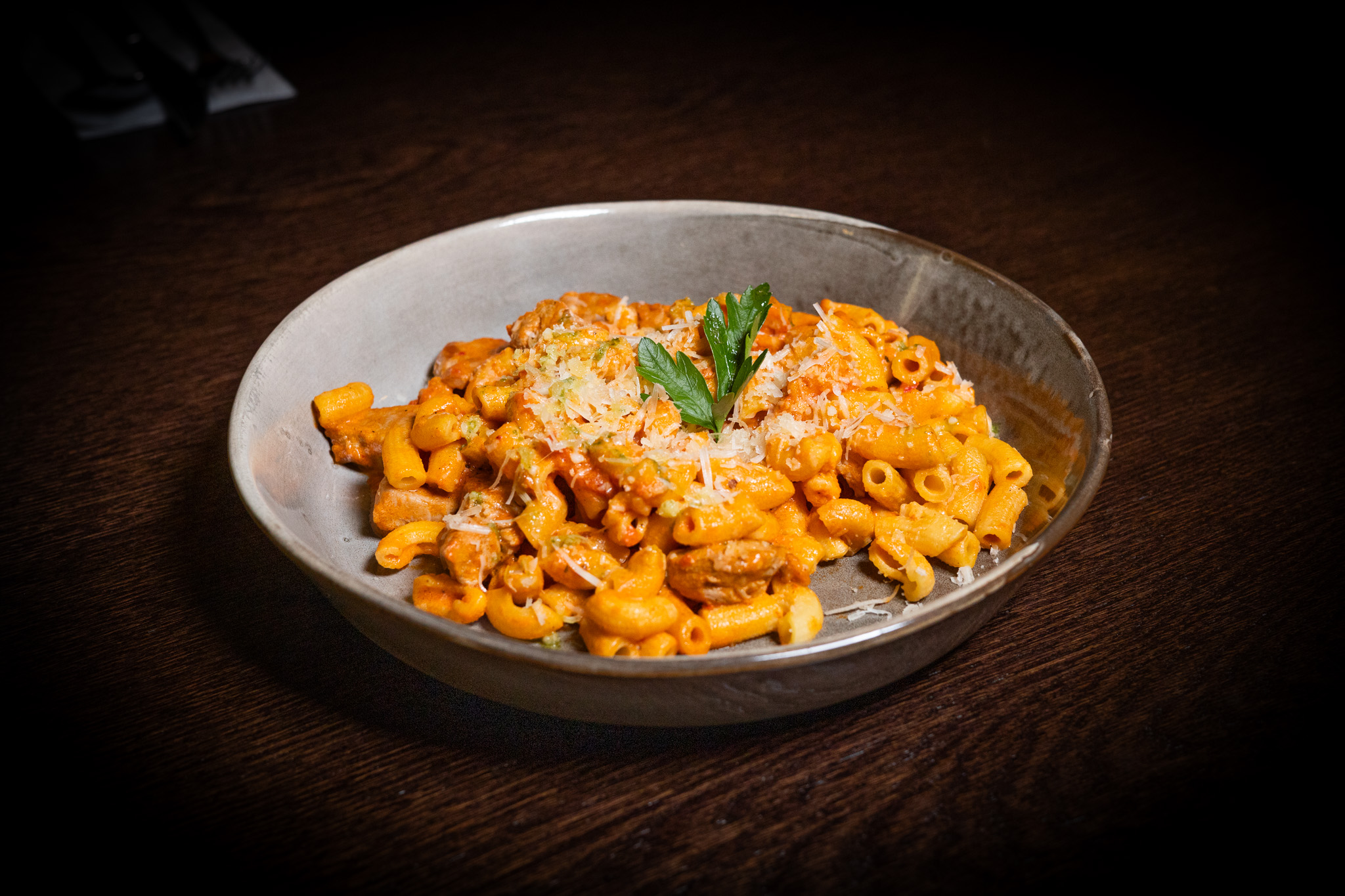 Rigatoni con filetto di maiale, salsa di crema di pomodoro con Nduja